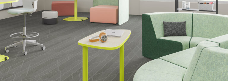 Steelcase curved lounge, seating, and tables, in an educational setting.