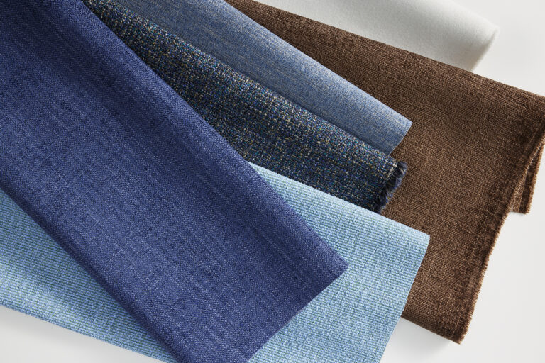 Various Designtex Crypton textiles in blues and brown