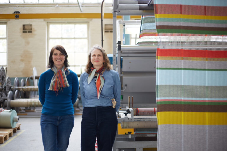 Photo of Emma and Harriet in weaving mill